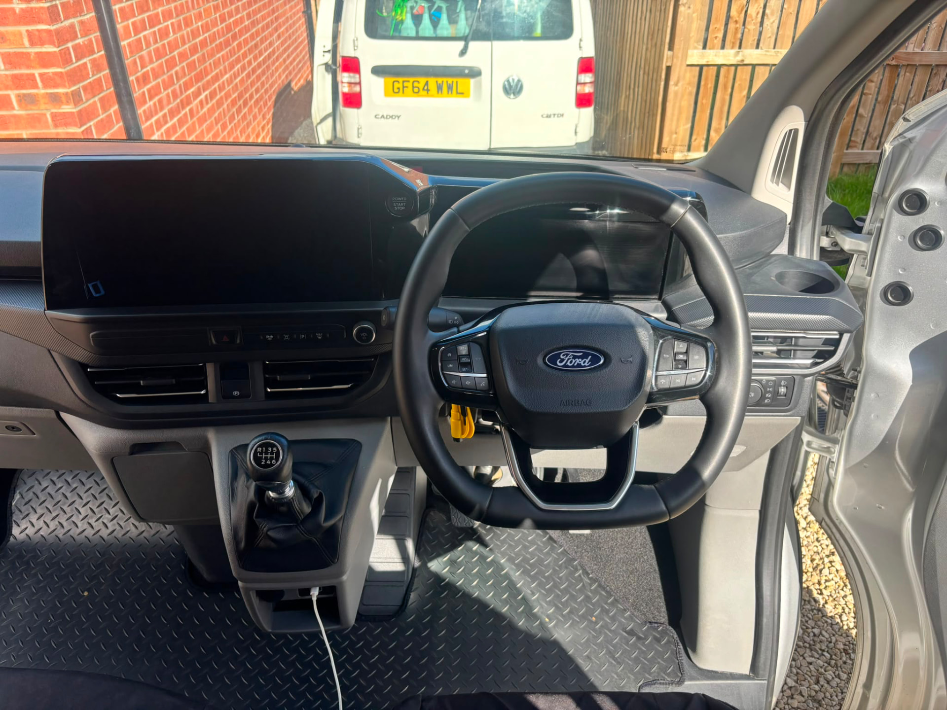 Van cockpit dashboard and floor mats cleaned by Site Clean